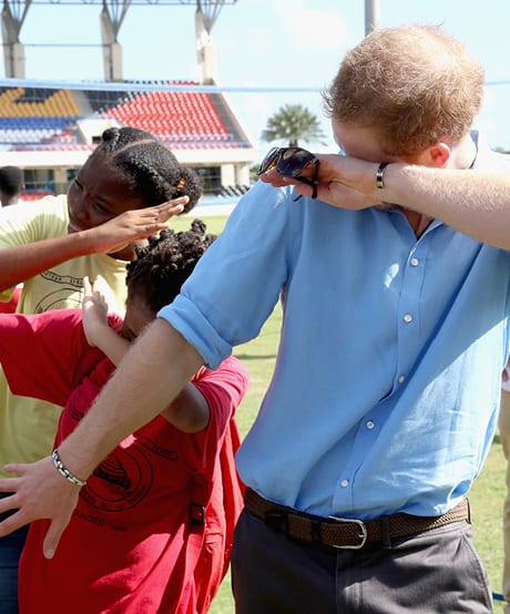 November 21, 2016: Prince Harry Dabs With School Girls in Antigua