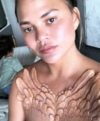 Kim Kardashian implant necklace Chrissy Teigen