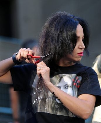 iran protests cutting hair